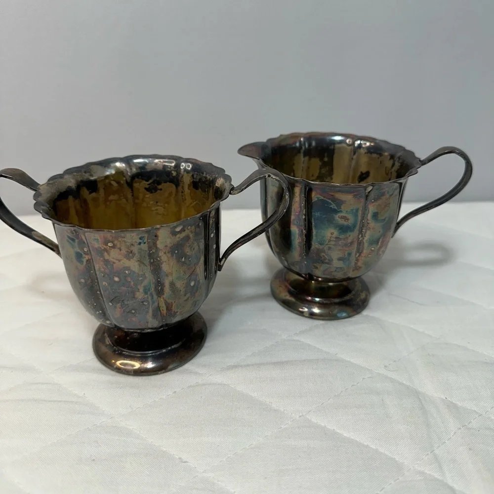 I gave Early American International Company Sugar And Cream Set Silver Plated